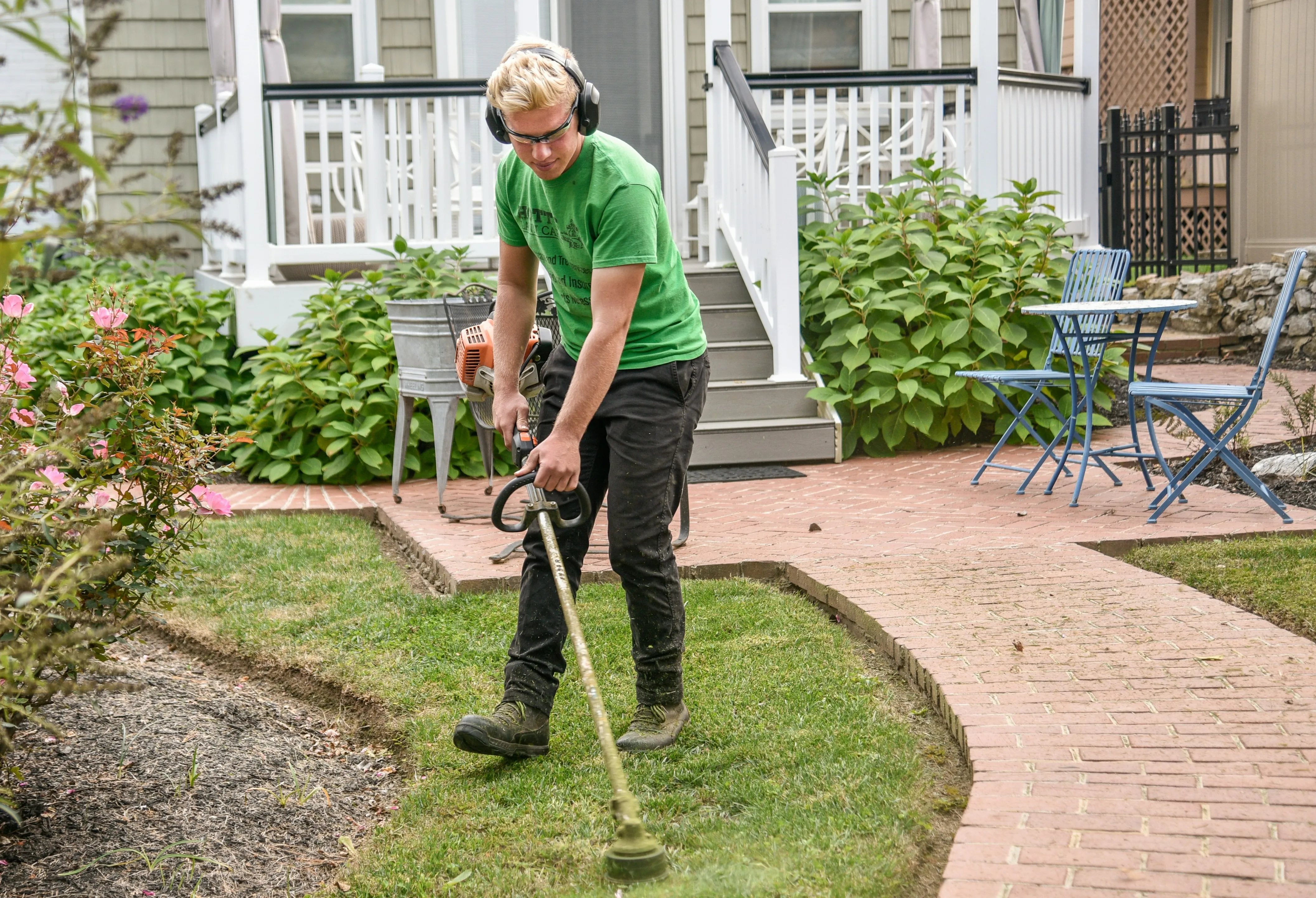 An Evercore team member landscaping